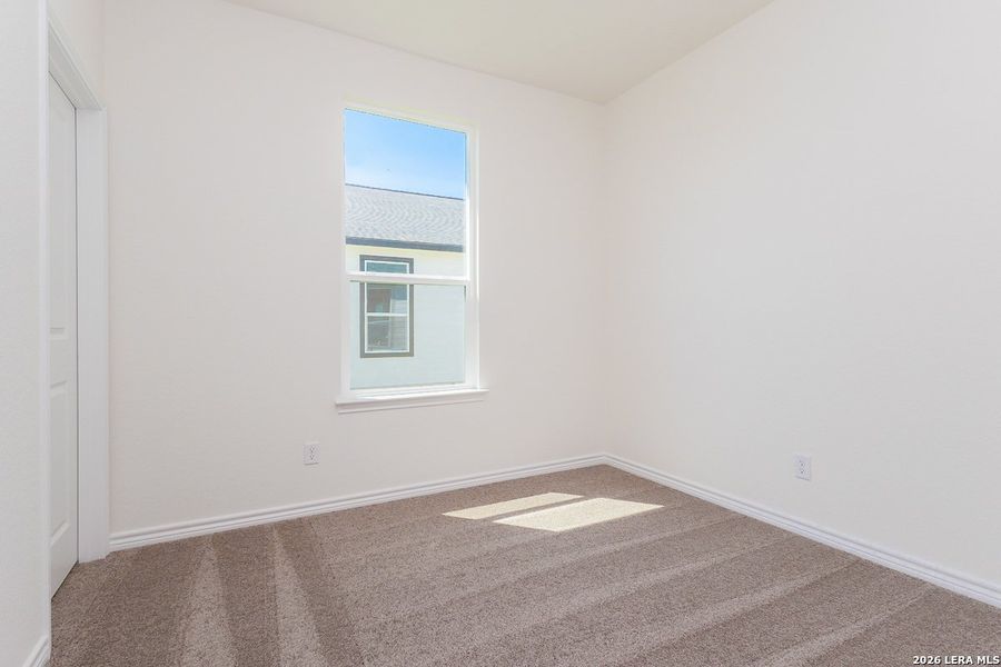 Spacious, unfurnished interior of a new home in Woodside Farms, Seguin (Image 6).