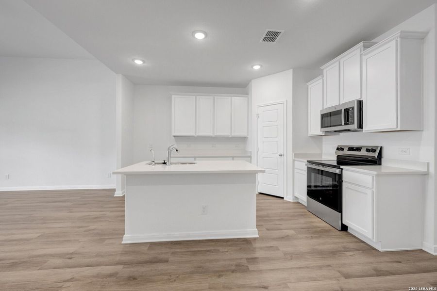 Furnished interior view inside a new home in Greenspoint Heights, Seguin (Image 16).