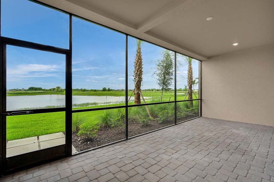 Exterior details and patio area of a home in Esplanade by the Islands Coach Homes, Naples (Image 3). Exterior details and patio area of a home in Esplanade by the Islands Coach Homes, Naples (Image 3).
