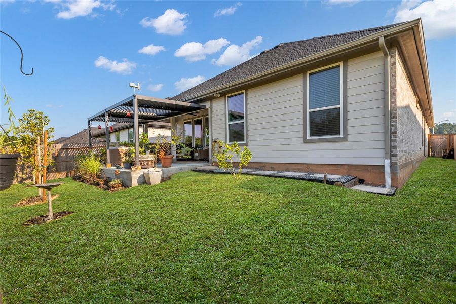 Front exterior of a new home in , Conroe, TX, highlighting curb appeal (Image 19).