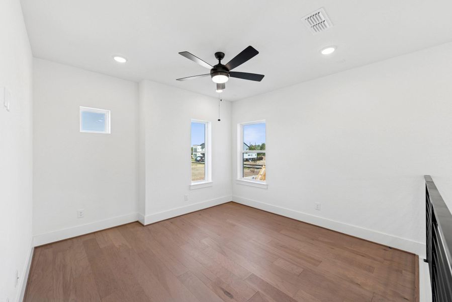 Spacious, unfurnished interior of a new home in Easthaven at Bridgeland Central - Horizon Collection, Cypress (Image 31).