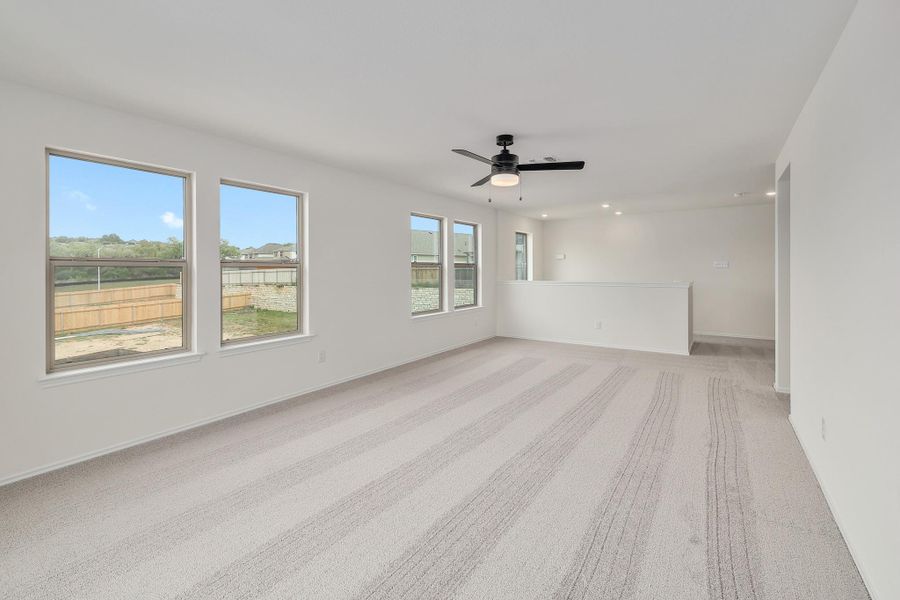Spacious, unfurnished interior of a new home in River Bluff, Leander (Image 27).