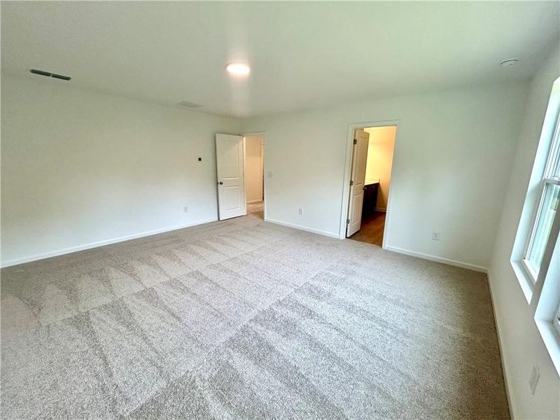 Spacious, unfurnished interior of a new home in The Pointe at Heron Bay, Locust Grove (Image 17).