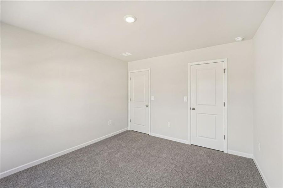 Spacious, unfurnished interior of a new home in Westmont Preserve, Powder Springs (Image 48).