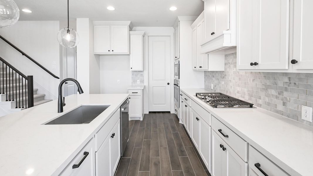 Furnished interior view inside a new home in Crosswinds 50', Kyle (Image 10).