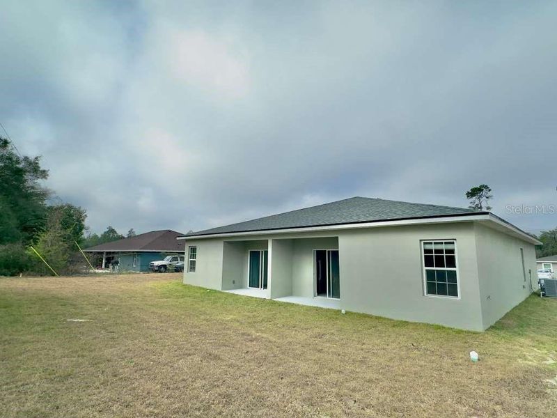 Exterior details and patio area of a home in , Ocala (Image 28).