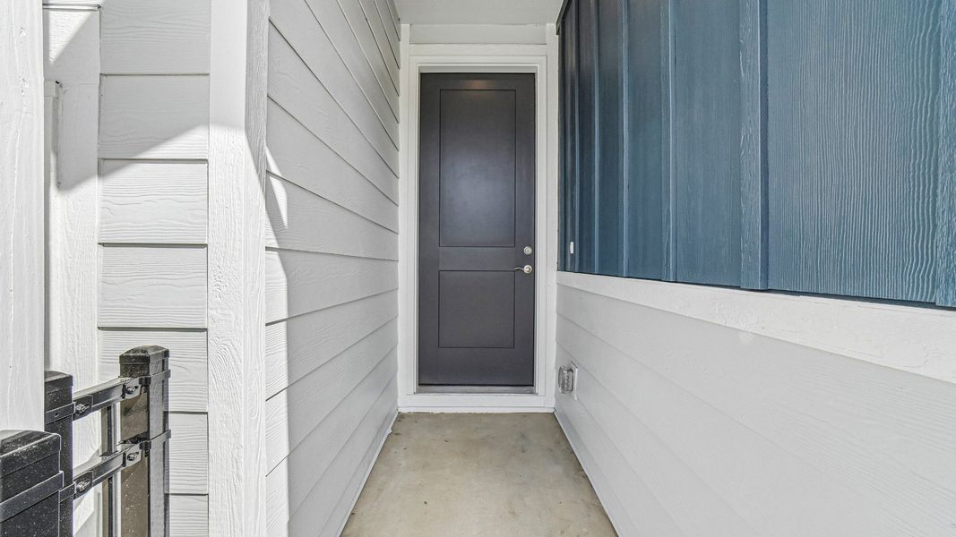 A welcoming front porch enhances the home's curb appeal