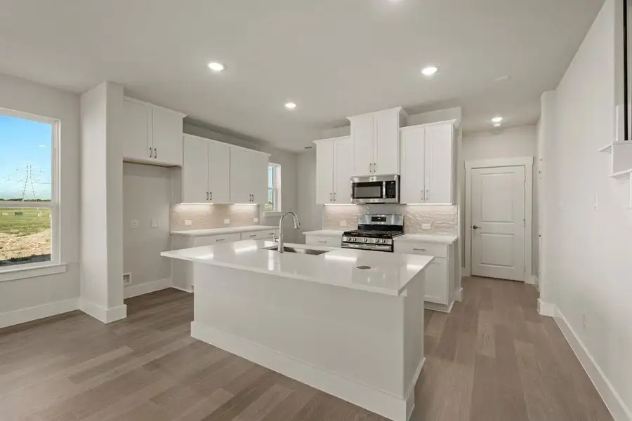 The chef will love being the center of attention in this gorgeous kitchen!