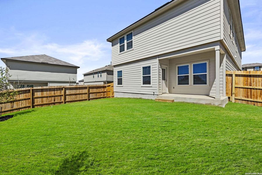 Exterior details and patio area of a home in Redbird Ranch, San Antonio (Image 2).