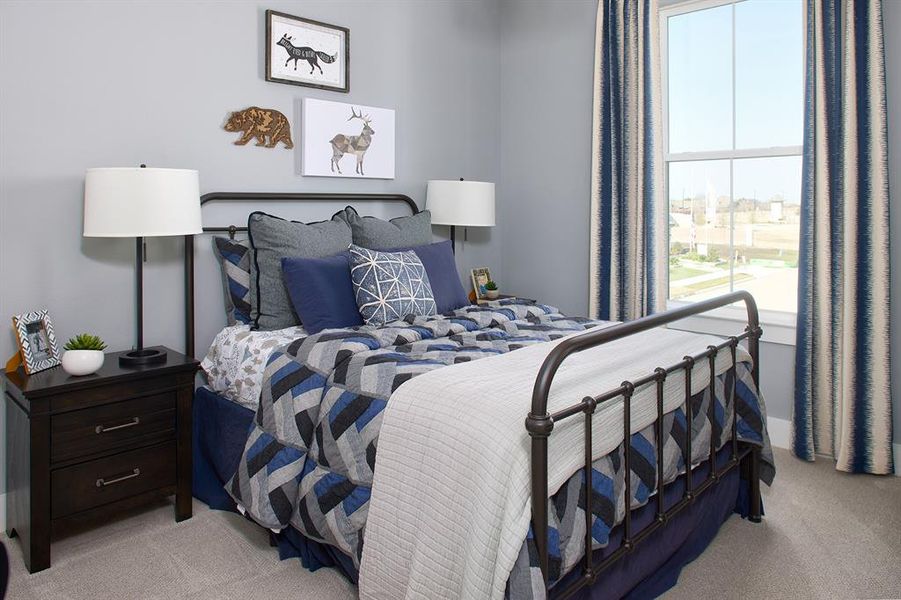 Bedroom with light carpet