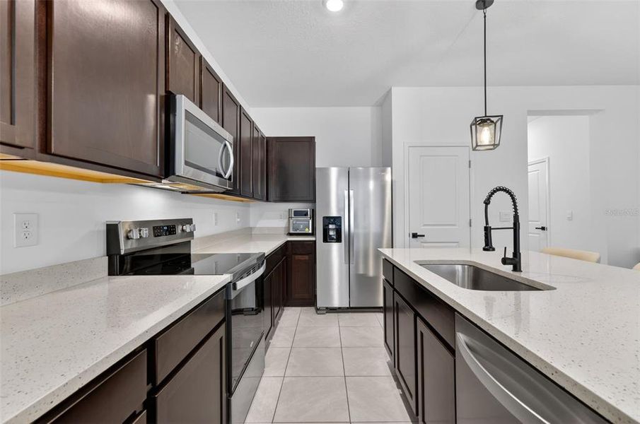 Furnished interior view inside a new home in Mangrove Point, Apollo Beach (Image 9).