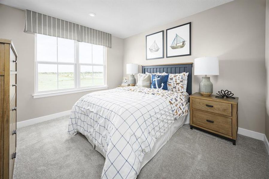 Representative furnished interior of a home built from the Grove by Ryan Homes in Malabar Springs, Palm Bay (Image 18).
