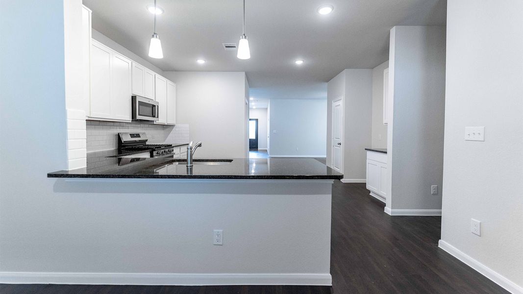 Furnished interior view inside a new home in The Canopies, Splendora (Image 3).