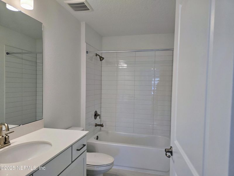Furnished interior view inside a new home in Hyland Trail, Green Cove Springs (Image 10). Furnished interior view inside a new home in Hyland Trail, Green Cove Springs (Image 10).
