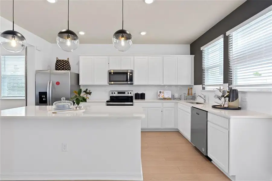 Furnished interior view inside a new home in Parkside Trails, Clermont (Image 9).