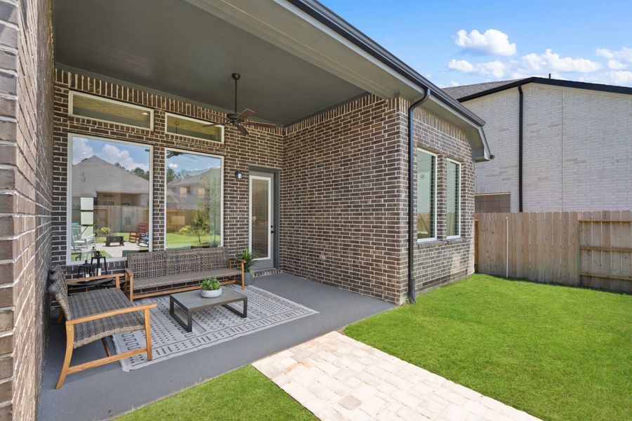 Exterior details and patio area of a home in Artavia, Conroe (Image 3).