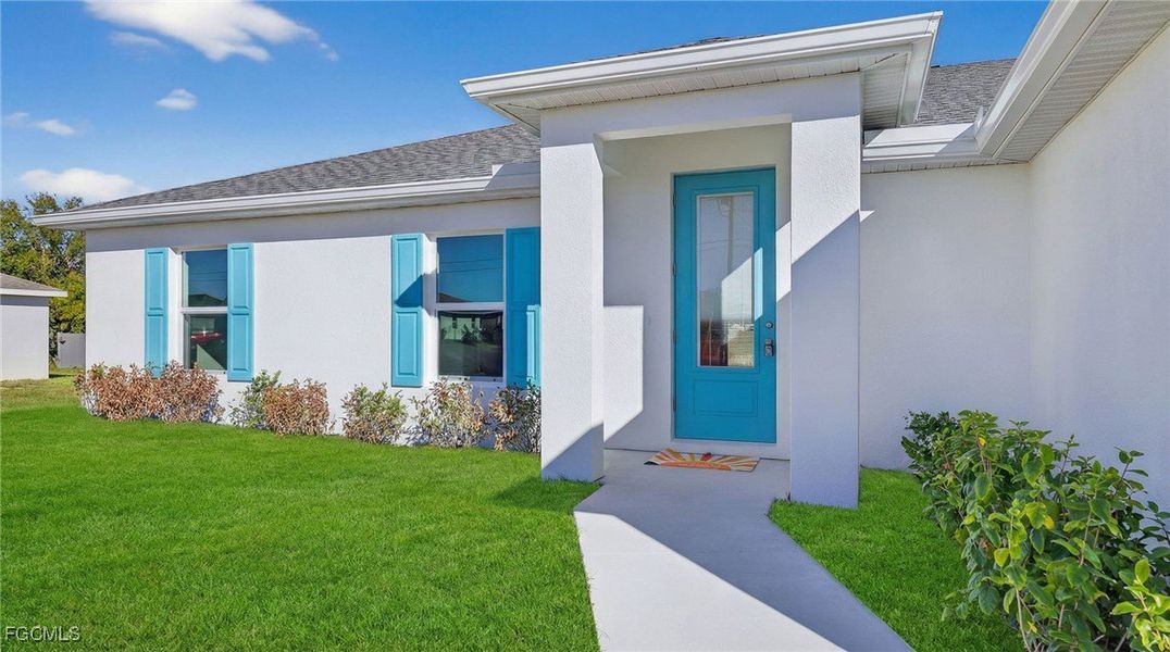 Exterior details and patio area of a home in Cape Coral, Cape Coral (Image 3).