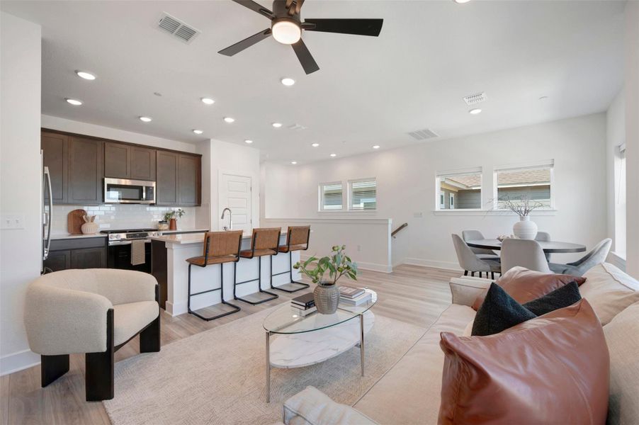 View of Kitchen - Dining Area (Staged) from Family Room