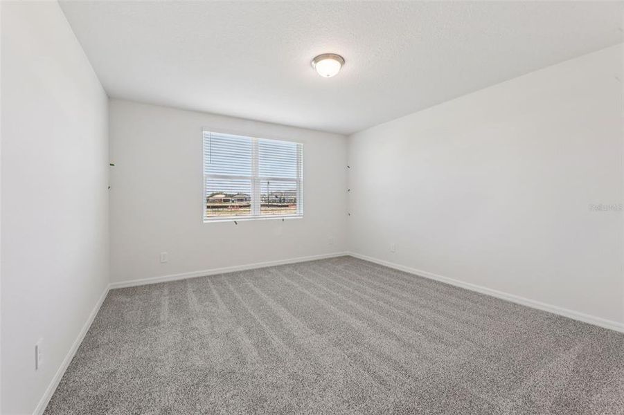 Spacious, unfurnished interior of a new home in Crosswinds - Signature Series, Haines City (Image 20).