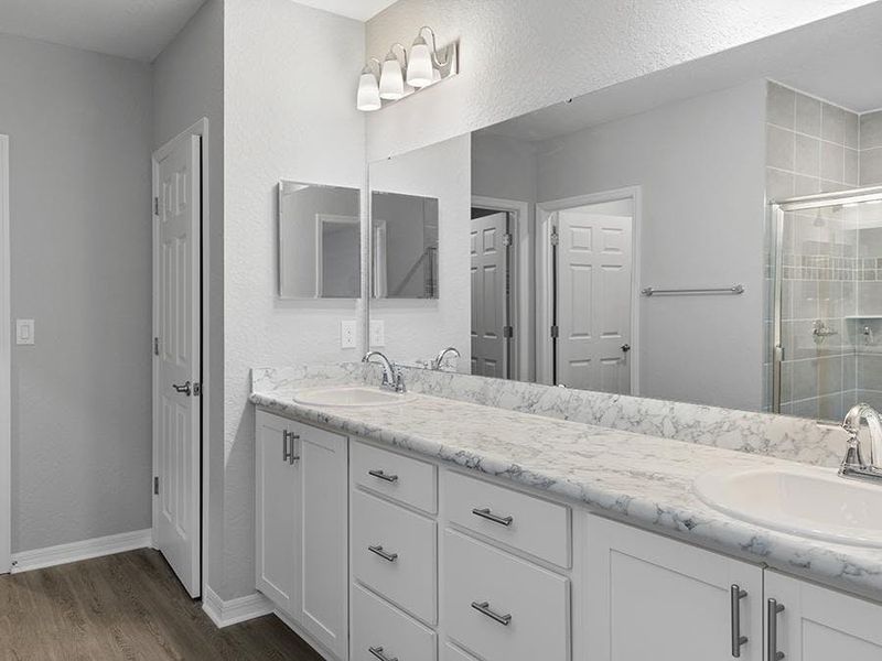 Your suite is complete with a spacious, private en-suite bath - Wayfair II home plan by Highland Homes