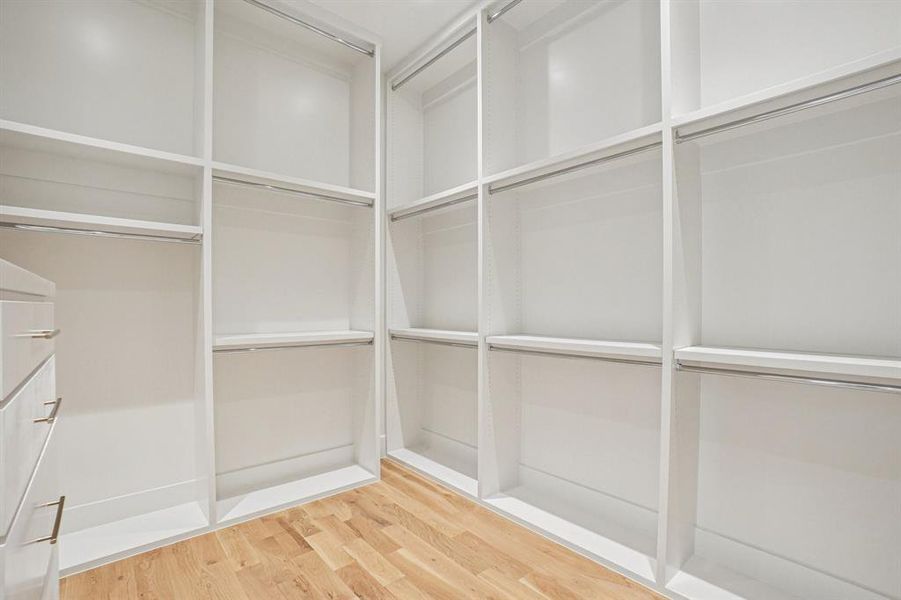 One of the 2 custom closets in primary suite One of the 2 custom closets in primary suite