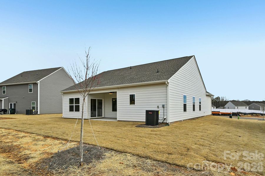Exterior details and patio area of a home in Colonial Crossing, Troutman (Image 3).