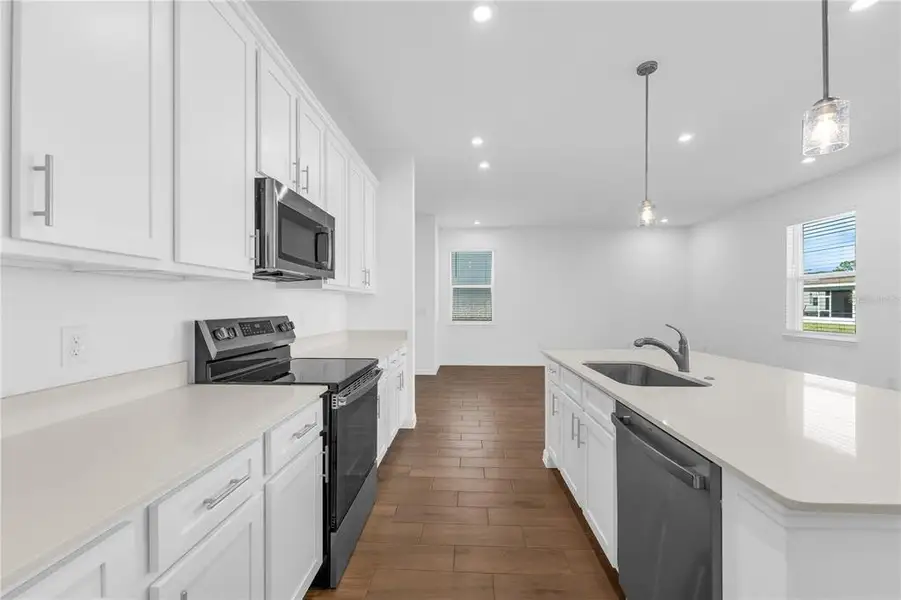 Furnished interior view inside a new home in Oakfield Trails, Parrish (Image 9).