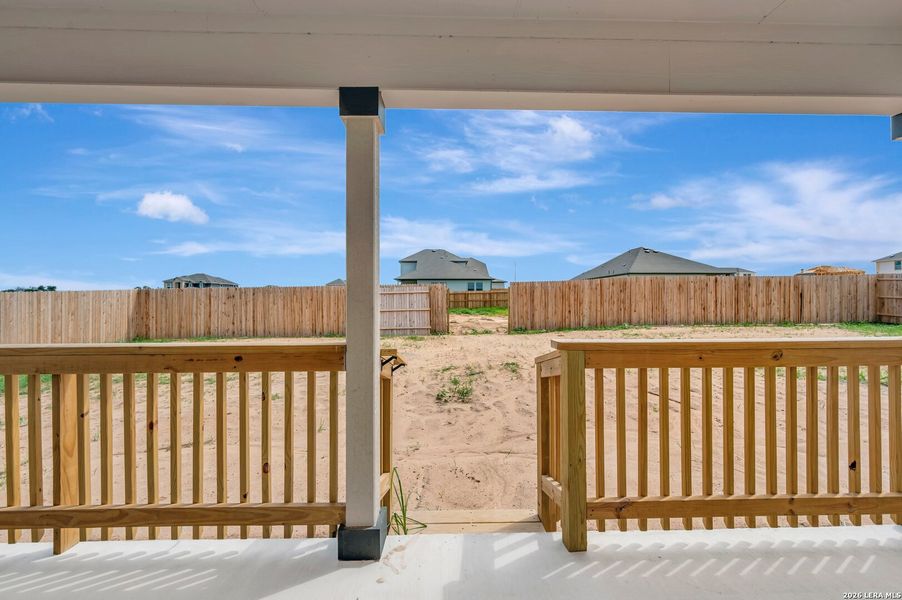 Exterior details and patio area of a home in Hickory Ridge Estates, Elmendorf (Image 4).