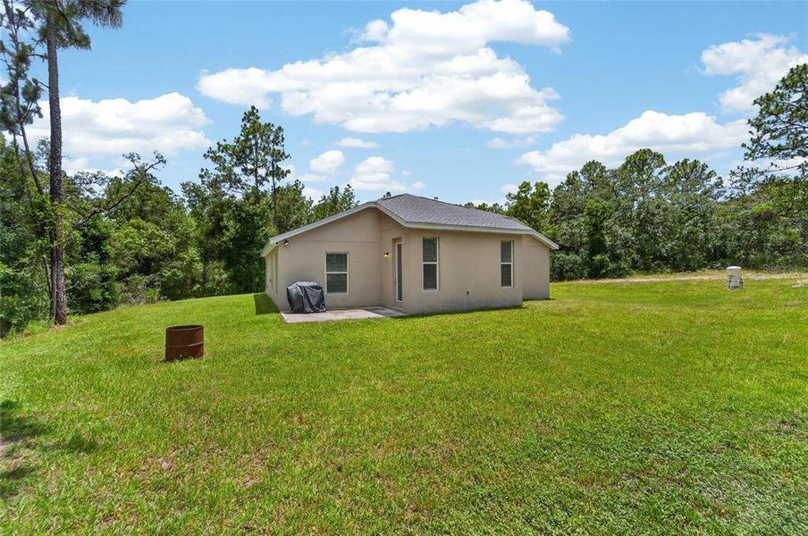 Exterior details and patio area of a home in , Brooksville (Image 24).