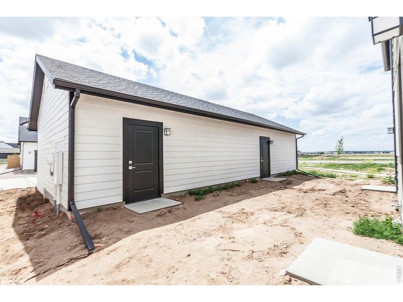 Exterior details and patio area of a home in Prairie Song Story Collection - Single Family Homes, Windsor (Image 28).