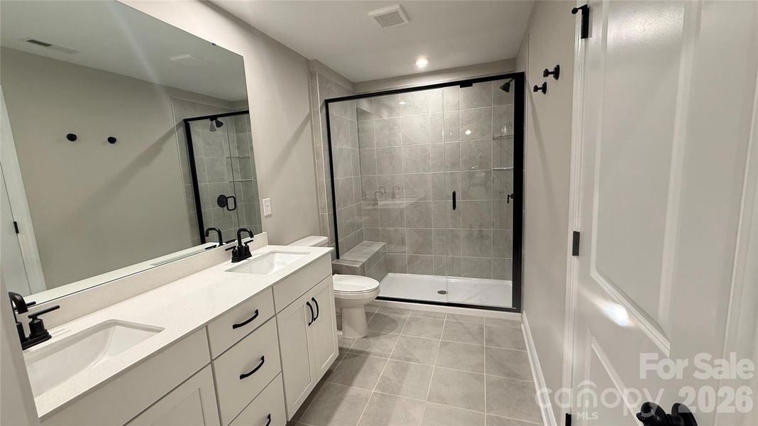 Furnished interior view inside a new home in The Townes at Wade Ardrey, Charlotte (Image 11).