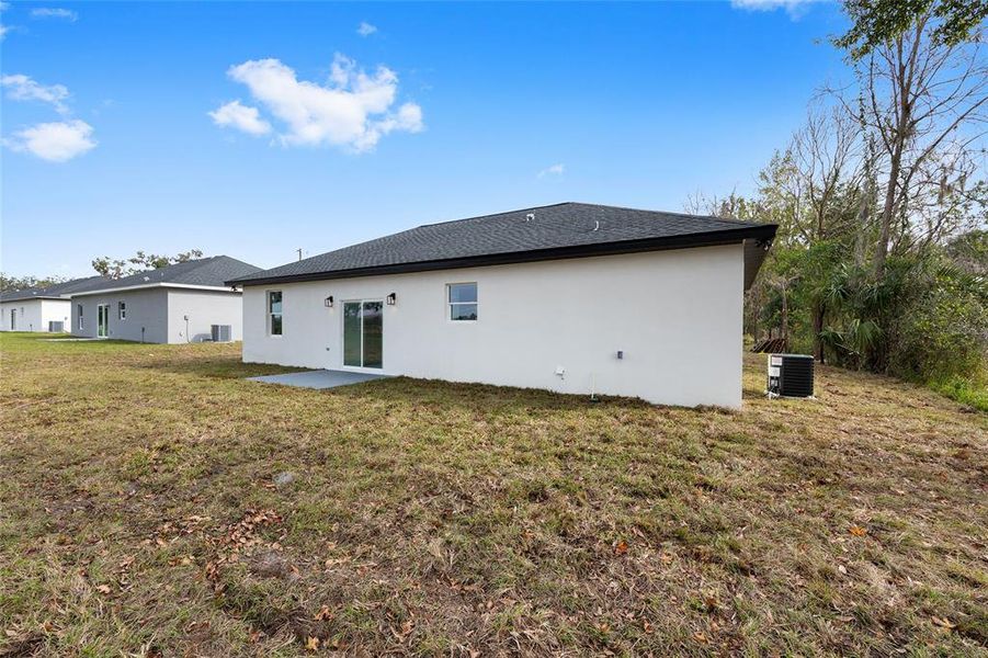 Exterior details and patio area of a home in , Summerfield (Image 3).