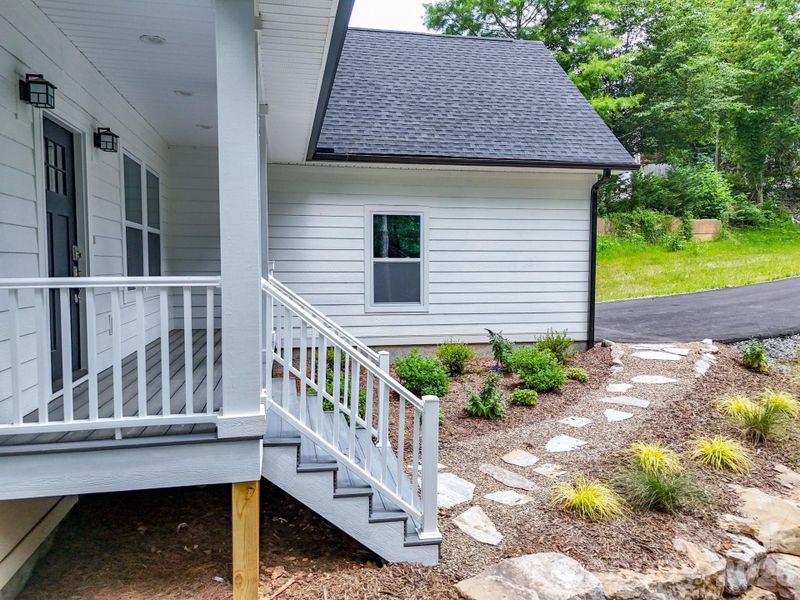 Exterior details and patio area of a home in , Black Mountain (Image 3). Exterior details and patio area of a home in , Black Mountain (Image 3).