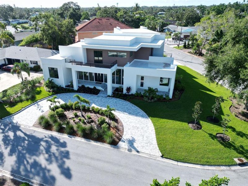 Front exterior of a new home in , Sarasota, FL, highlighting curb appeal (Image 28). Front exterior of a new home in , Sarasota, FL, highlighting curb appeal (Image 28).