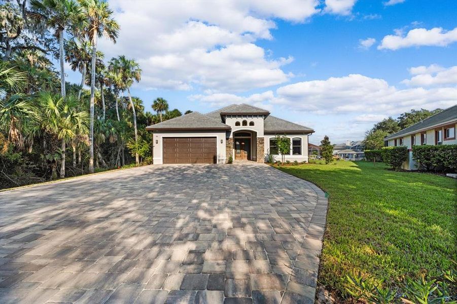 Front exterior of a new home in , Palm Coast, FL, highlighting curb appeal (Image 29).