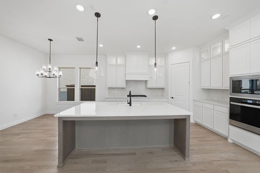 Furnished interior view inside a new home in Light Farms Brenham - 40' Lots, Celina (Image 9). Furnished interior view inside a new home in Light Farms Brenham - 40' Lots, Celina (Image 9).