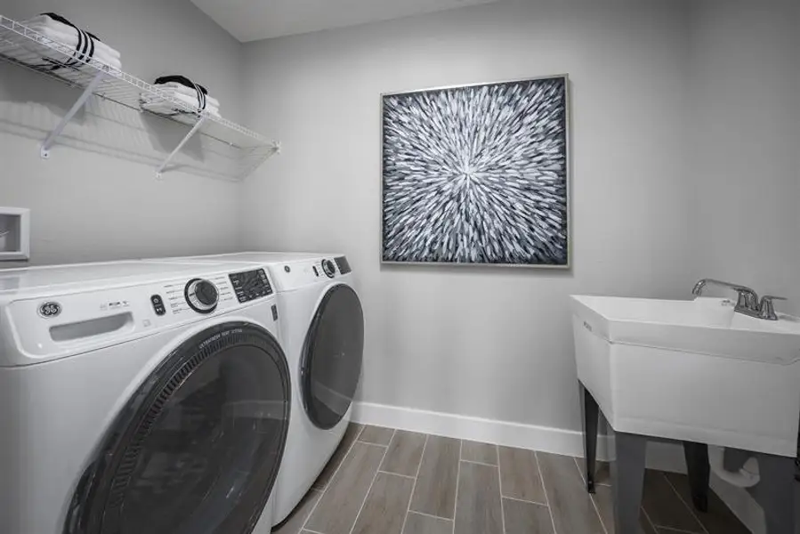 Representative furnished interior of a home built from the Winterset by Ryan Homes in Lake Nellie Crossing, Clermont (Image 18).