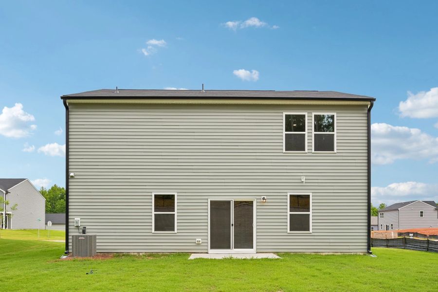 Exterior details and patio area of a home in Middleton Farms, Middlesex (Image 23).