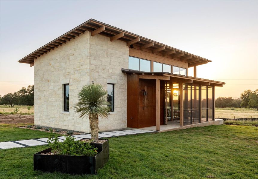 Exterior details and patio area of a home in , Hye (Image 19).