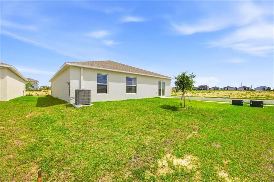 Exterior details and patio area of a home in Hunt Club Groves, Lake Wales (Image 22).