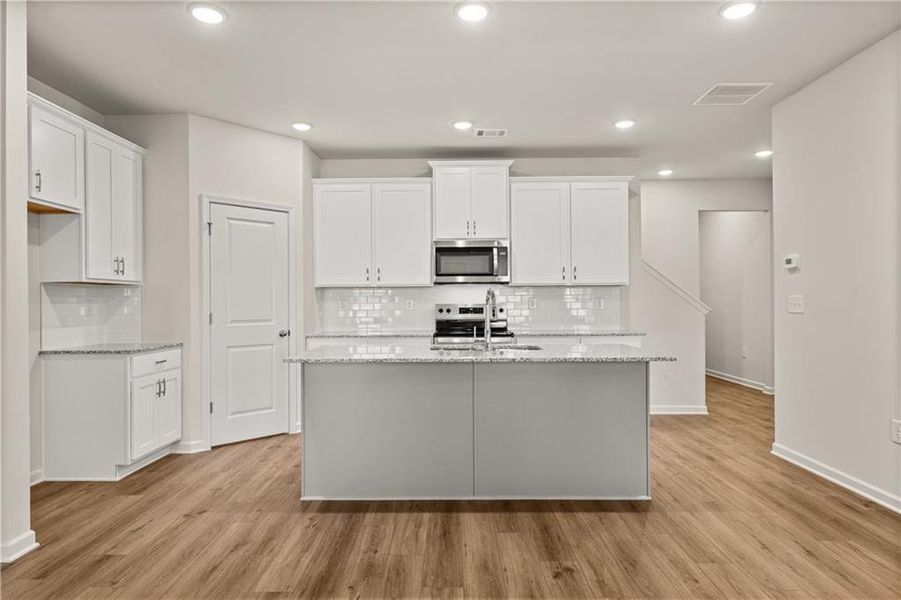 Furnished interior view inside a new home in Lake Carlton, Loganville (Image 6).