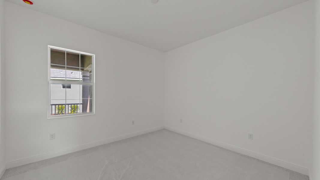 Spacious, unfurnished interior of a new home in Verandah Real Estate and Homes for Sale in Fort Myers, FL - Neal Communities, Fort Myers (Image 25).