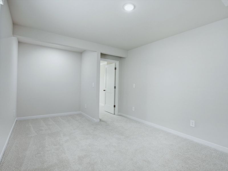 Spacious, unfurnished interior of a new home in Marshburn Landing - Bungalow Series, Wendell (Image 15).