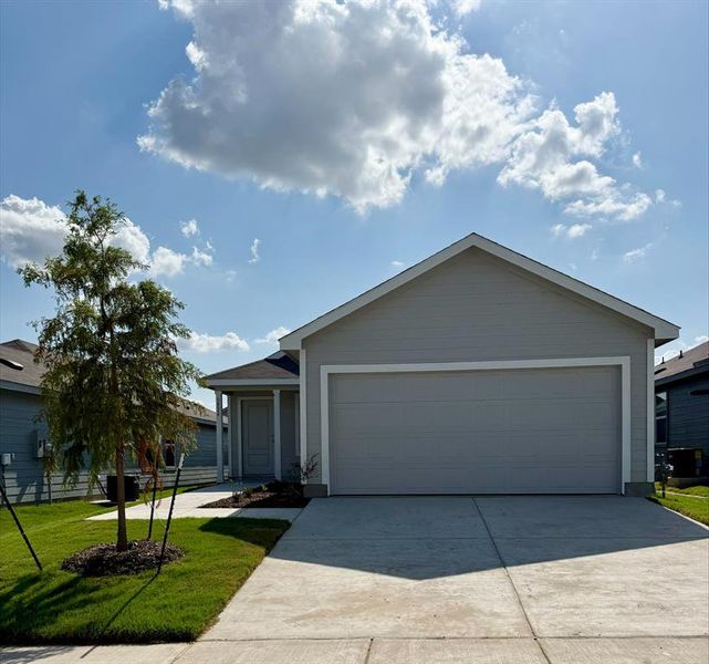 Front exterior of a new home in Luella Crossing, Sherman, TX, highlighting curb appeal (Image 1). Front exterior of a new home in Luella Crossing, Sherman, TX, highlighting curb appeal (Image 1).