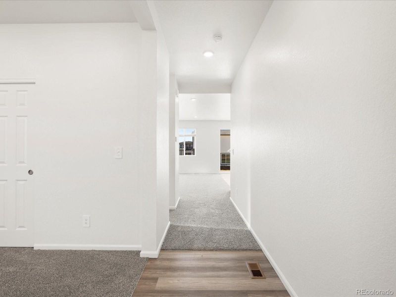 Spacious, unfurnished interior of a new home in Ridgeline Vista: The Flora Collection, Brighton (Image 20).