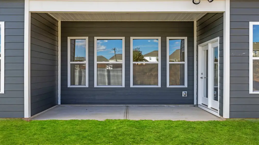 Exterior details and patio area of a home in Whitehawk Meadows, Travelers Rest (Image 4).