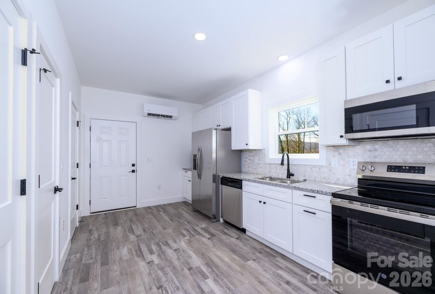 Furnished interior view inside a new home in , Candler (Image 7).