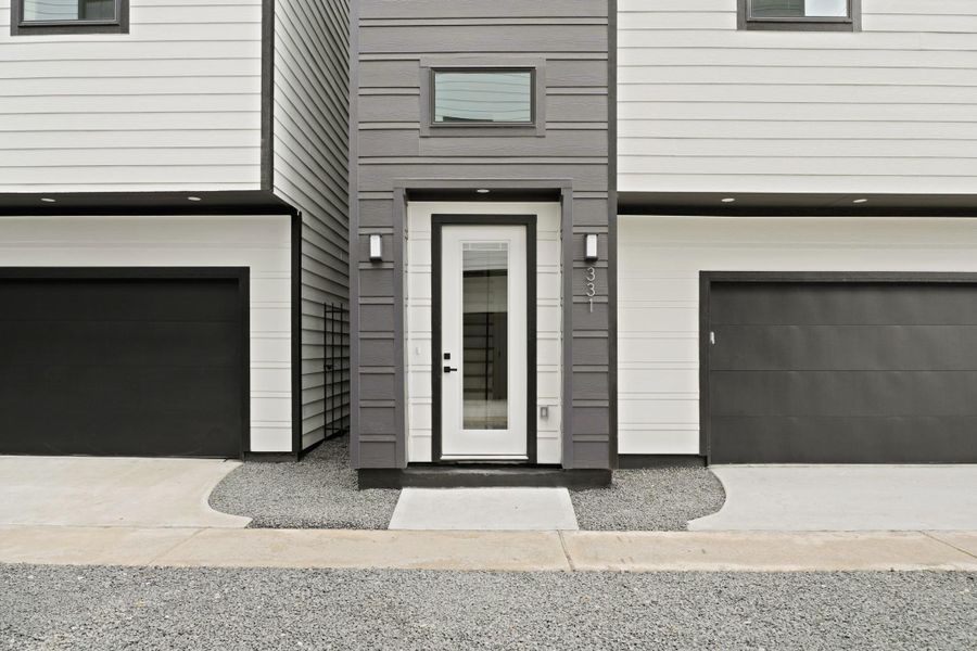 With modern finishes and fixtures inside and out, the front porch offers a welcoming entrance with an 8-foot glass panel door with internal blinds and two coach lights. The smart garage has a Q app and a separate storage room. With modern finishes and fixtures inside and out, the front porch offers a welcoming entrance with an 8-foot glass panel door with internal blinds and two coach lights. The smart garage has a Q app and a separate storage room.