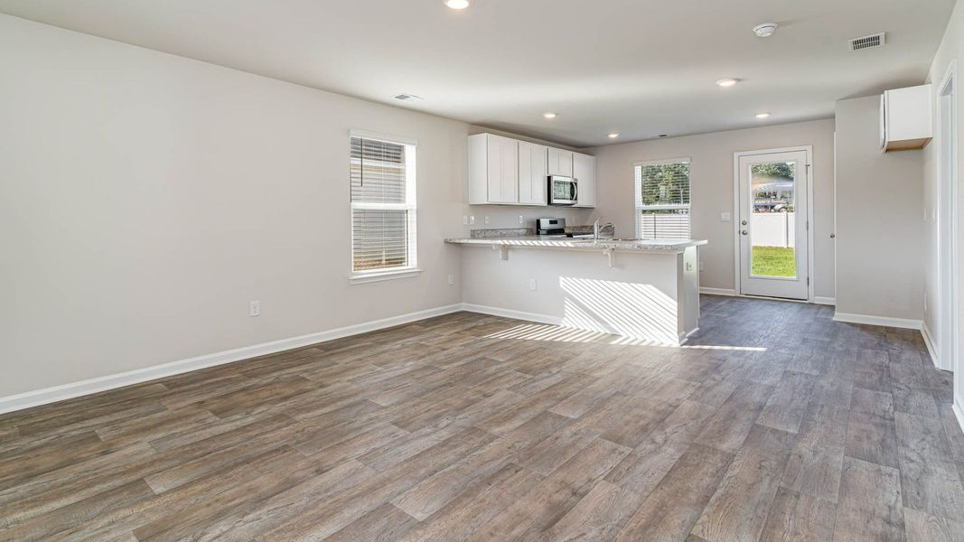 Representative unfurnished interior of a home built from the CURTIS by D.R. Horton in The Cottages at Blake Farm, Wilmington (Image 15). Representative unfurnished interior of a home built from the CURTIS by D.R. Horton in The Cottages at Blake Farm, Wilmington (Image 15).