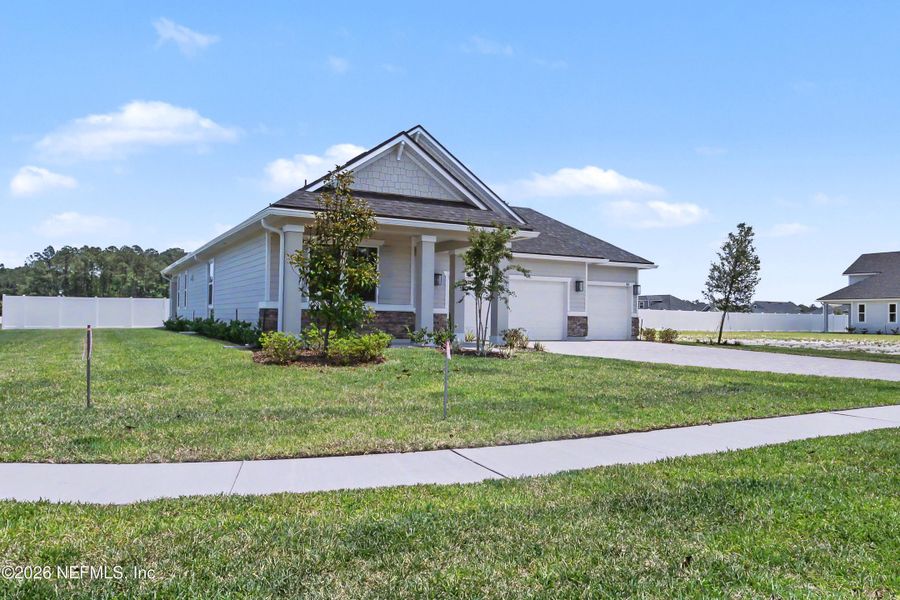 Front exterior of a new home in , St. Augustine, FL, highlighting curb appeal (Image 2). Front exterior of a new home in , St. Augustine, FL, highlighting curb appeal (Image 2).